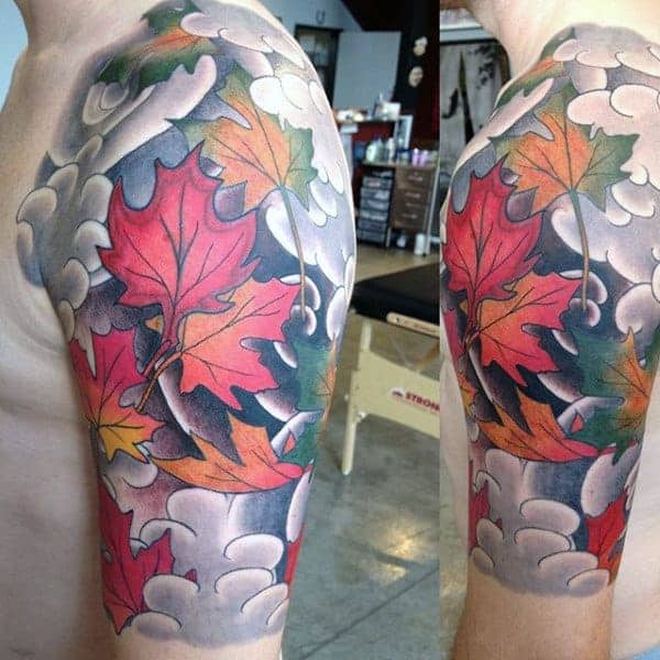 awesome-clouds-with-maple-leaves-mens-half-sleeve-tattoo-designs