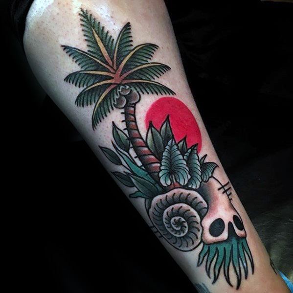 Colorful coconut tree tattoo on forearm with a red sun, leaves, seashell, and skull, blending tropical and surreal elements.