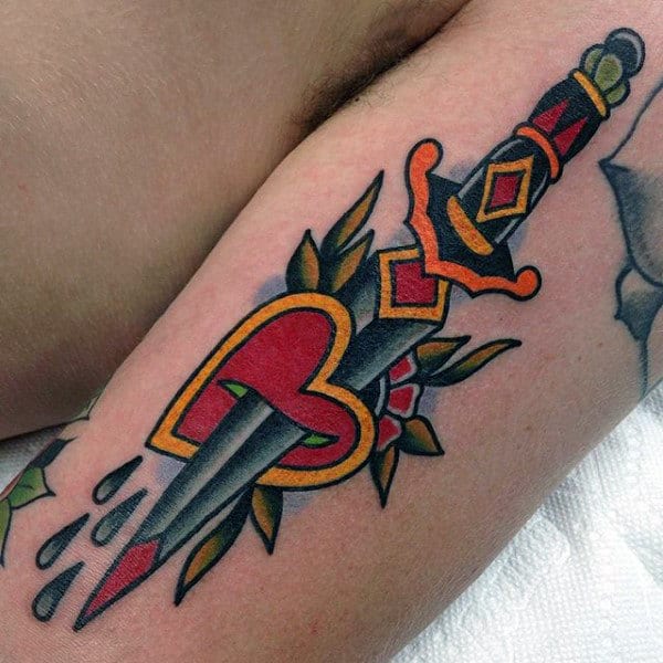 Awesome Dagger Going Through Heart Male Traditional Arm Tattoo Ideas