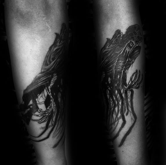 Dark Dementor tattoo on the forearm with skeletal hands, shadowy tendrils, and a haunting, floating appearance.