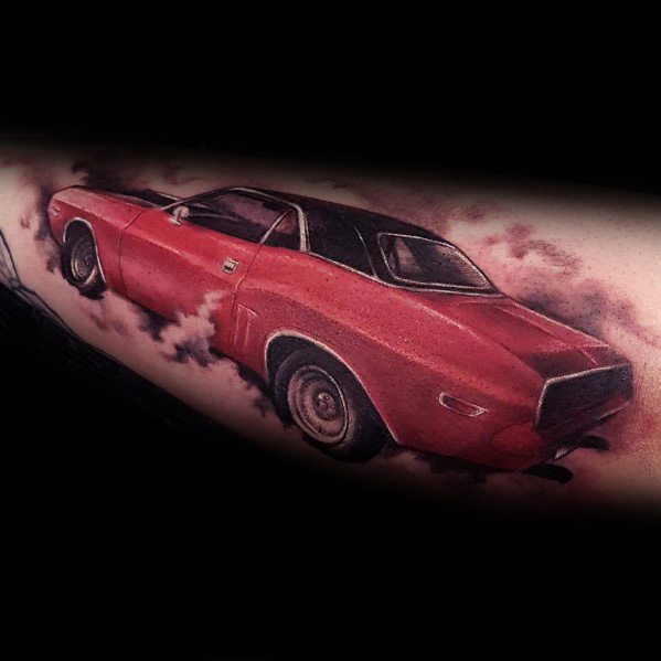 Realistic red Dodge Challenger tattoo with smoke effect, creating a dynamic and powerful muscle car design on the skin.