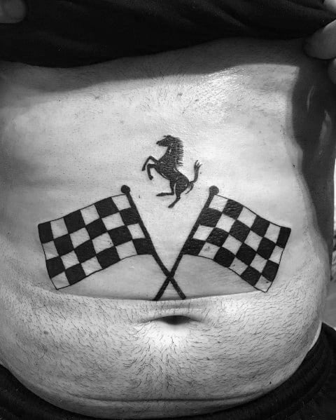 Ferrari-inspired tattoo featuring a prancing black horse above two crossed checkered racing flags, symbolizing speed and victory.