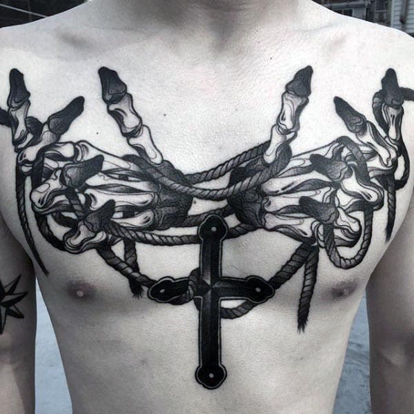 Awesome Hand Bones Holding Rope And Cross Mens Chest Tatoo