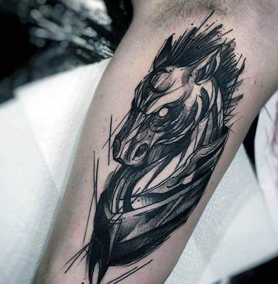 Abstract black ink horse head tattoo with dynamic brush strokes and sketch-style lines on the upper arm
