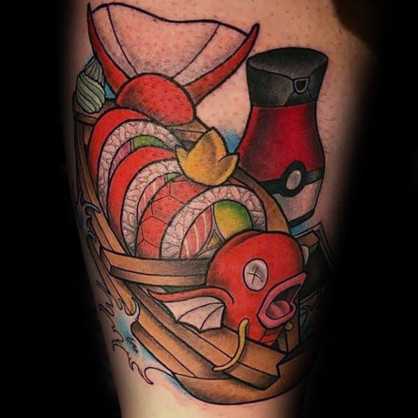 Magikarp sushi-themed tattoo with a Poké Ball soy sauce bottle, colorful sushi rolls, and dynamic wave accents.