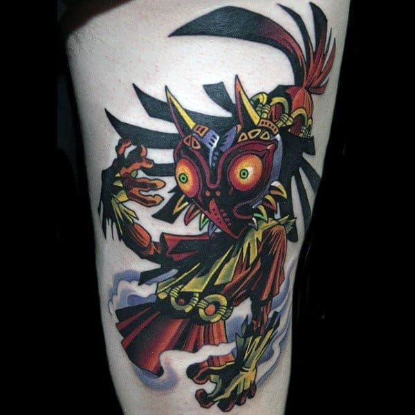 Awesome Majoras Mask Thigh Tattoo On Male