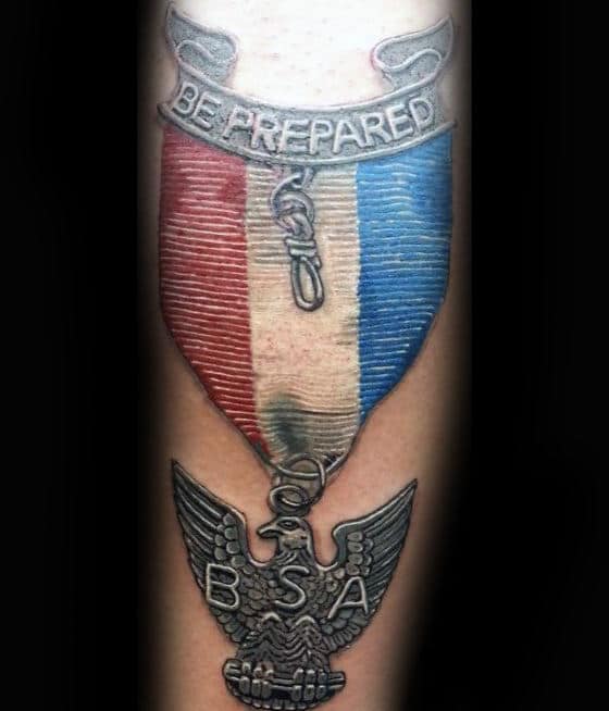 Awesome Male Eagle Scout Badge Tattoo On Forearm