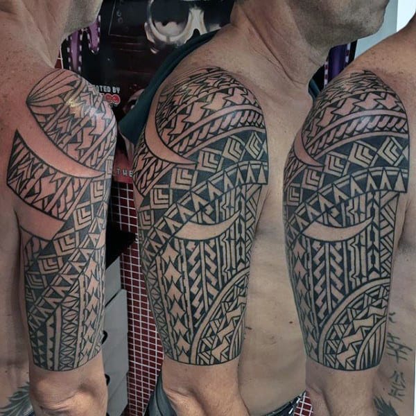 Awesome Male Half Sleeve Tribal Tattoo