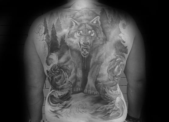 Awesome Male Shaded Black And Grey Ink Wolf Back Tattoo