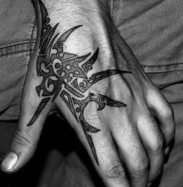 Awesome Male Tribal Tattoo Design Inspiration