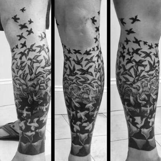 Leg tattoo inspired by MC Escher’s “Sky and Water,” with birds morphing into fish in a seamless and surreal transition.