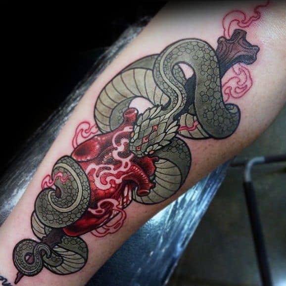 Neo-traditional tattoo of a coiled snake wrapped around a red, anatomically detailed heart, with bold shading and intricate linework.