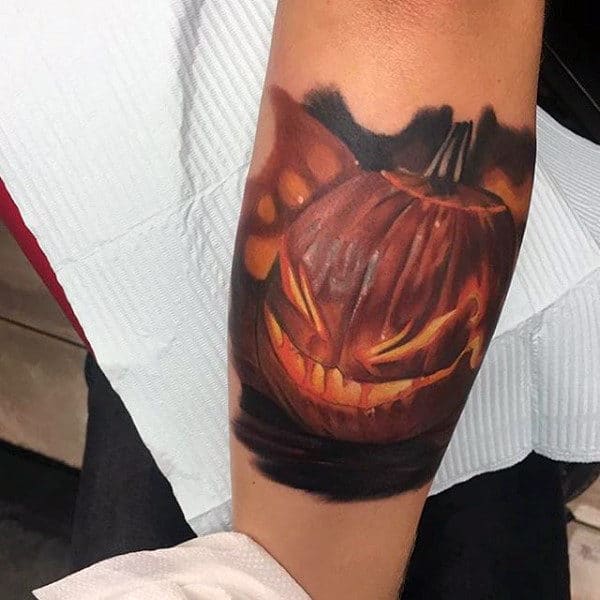 Awesome Realistic Jack O Latern Pumpkin Tattoos For Men