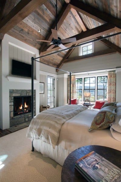 rustic bedroom with fireplace