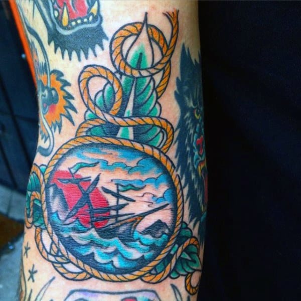 Awesome Sea Side Image In Rope Lopp Tattoo Male Forearms