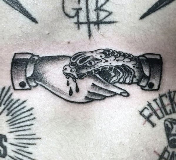 Awesome Snake Biting Hand Mens Old School Small Chest Tattoos