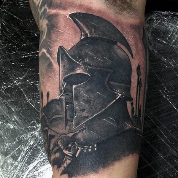 Awesome Spartan Male Spear Tattoo On Inner Arm