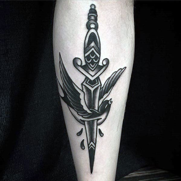 Tattoo of a dagger with a bird in flight and three teardrops on the forearm
