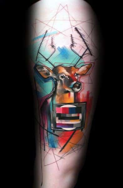 Watercolor-style deer tattoo with geometric antlers, vibrant abstract splashes, and a vintage TV test pattern on its chest, outlined in sketch lines.