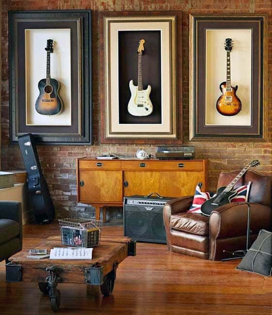 contemporary living space brick wall with framed guitar artwork 