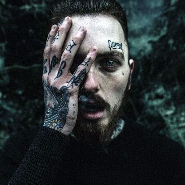 Awesome Word Tattoo On Mans Face