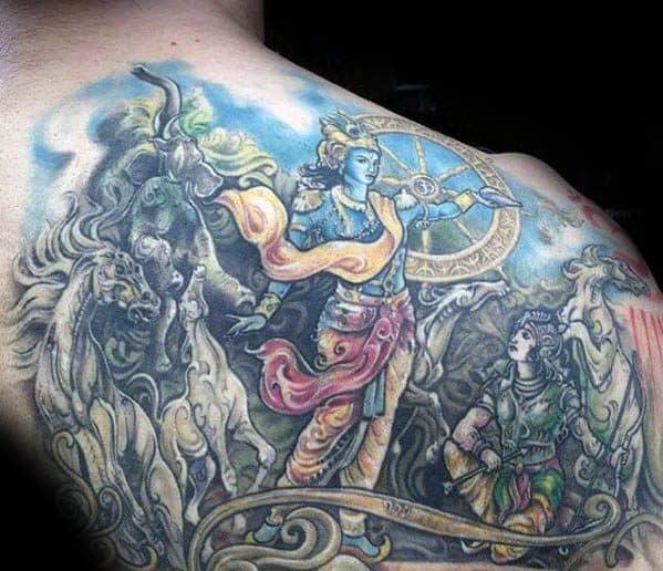 Epic Krishna tattoo across the upper back depicting the Mahabharata scene of Krishna as Arjuna’s charioteer, holding a chakra amidst galloping horses.