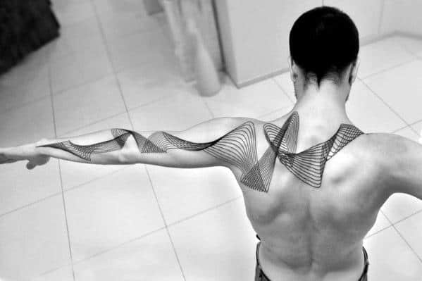 Intricate geometric tattoo across back and arm
