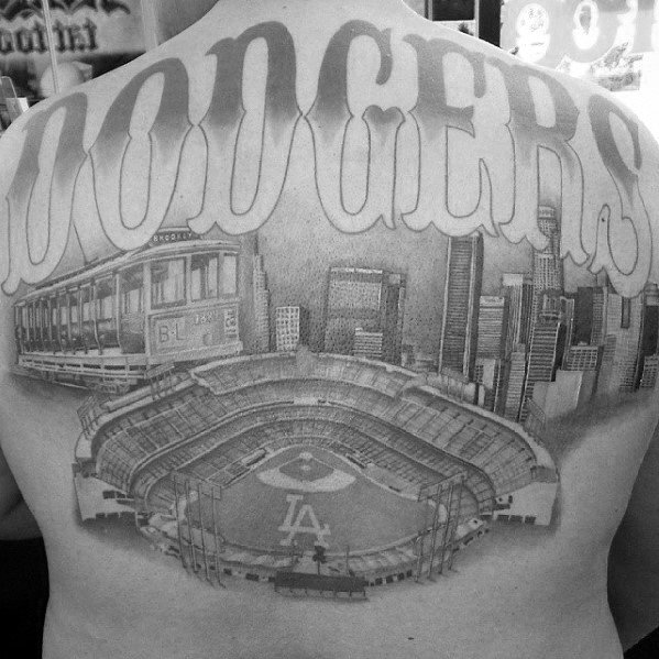 Full back tattoo featuring Dodger Stadium, Los Angeles skyline, and bold "Dodgers" lettering in shaded black and gray ink.