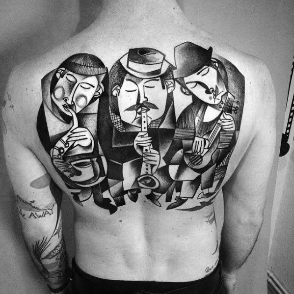 Large Cubist-style back tattoo of a jazz trio with saxophone, trumpet, and guitar, using bold black lines and abstract forms.