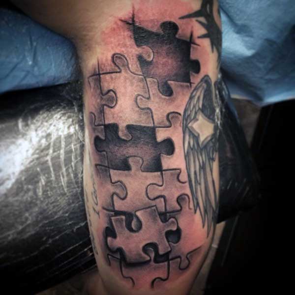 Back Of Arm Mens Bicep Puzzle Piece Tattoo