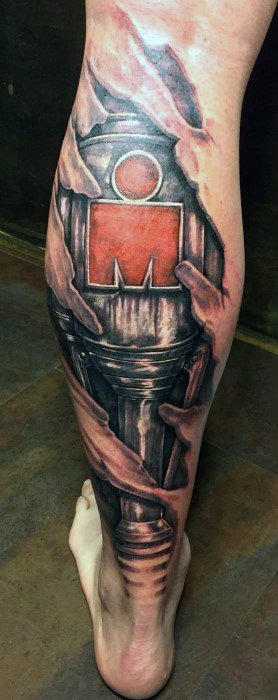 Tattoo featuring the Ironman logo surrounded by a dramatic torn skin effect, symbolizing the intense commitment and endurance of the race.