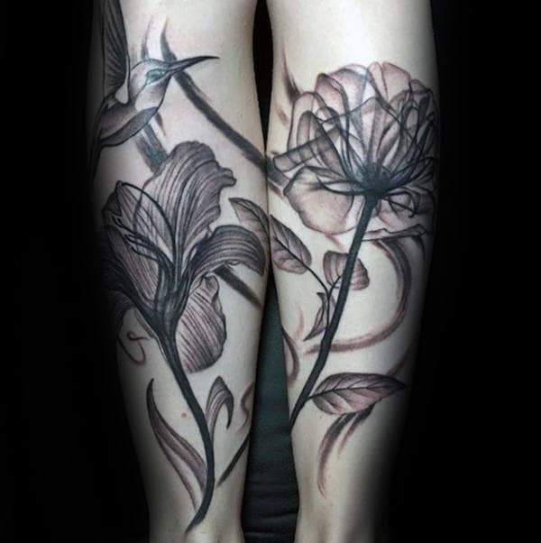 Back Of Legs Guys Hummingbird With Flowers Tattoo