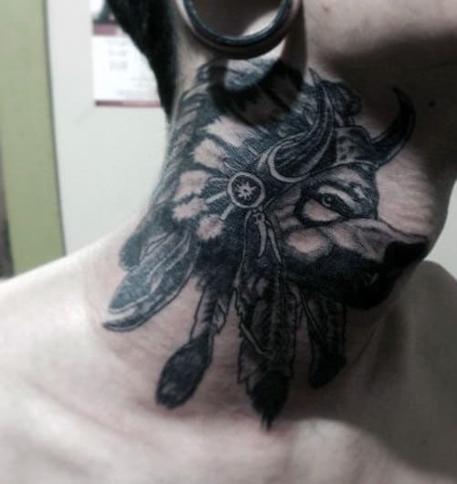 Neck tattoo of a bison head wearing a feathered headdress