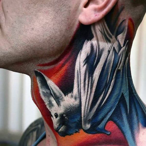 Person's neck with a detailed tattoo of a bat against a colorful background