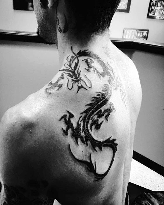 Back Of Shoulder Guys Black Ink Tribal Dragon Tattoo Inspiration