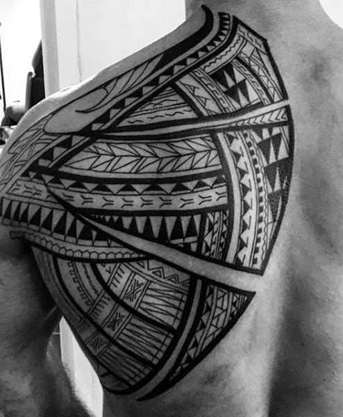 Back Of Shoulder Large Maori Tribal Tattoo For Guys