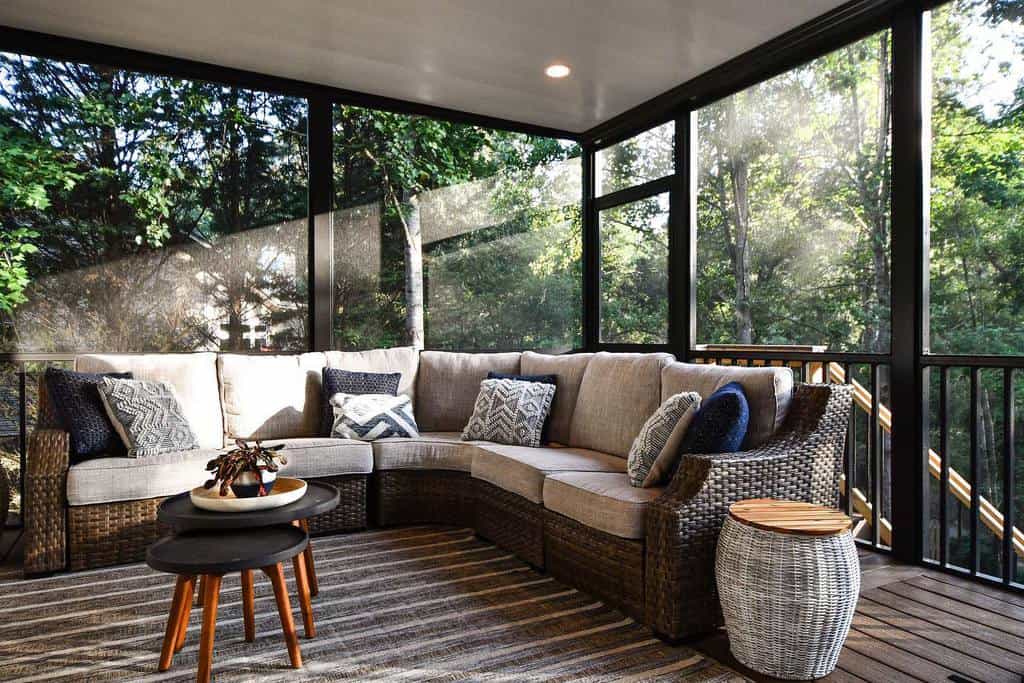 stylish back porch covered wicker couch