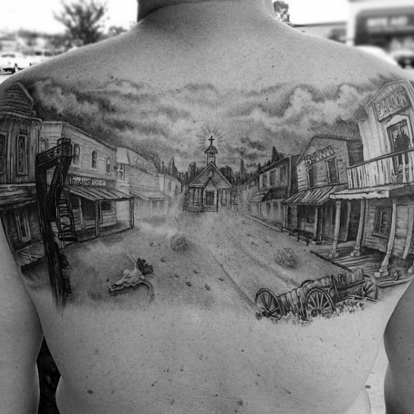 Back Tattoo Scene Of Western Town Abandoned In Black And White On Man