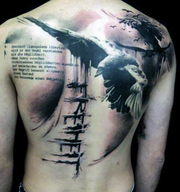 Back tattoo of a large flying bird with text in German