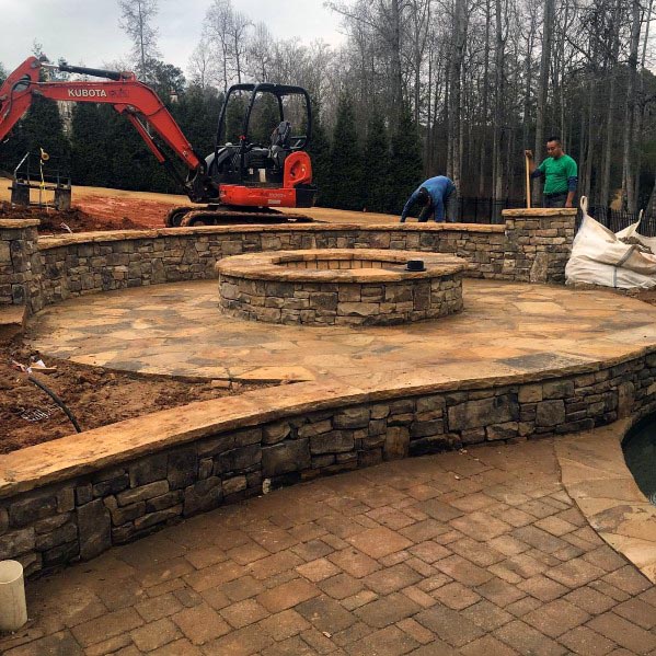 Backyard Flagstone Patio Design Ideas With Built In Round Fire Pit