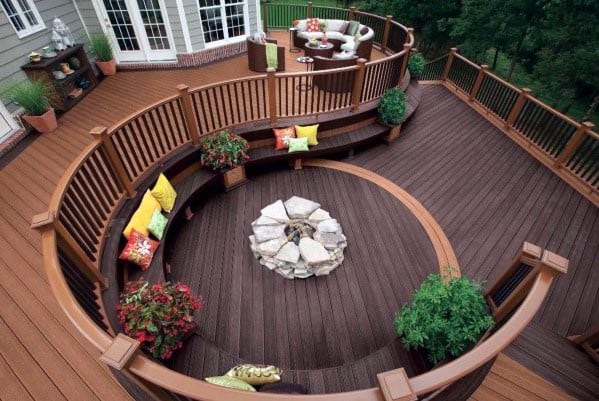 layered natural stone deck firepit