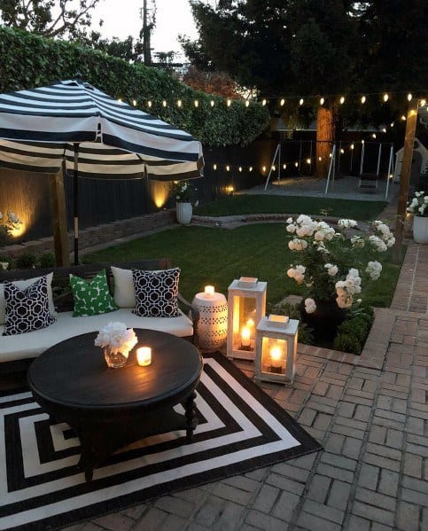 backyard ideas stone patio string lighting