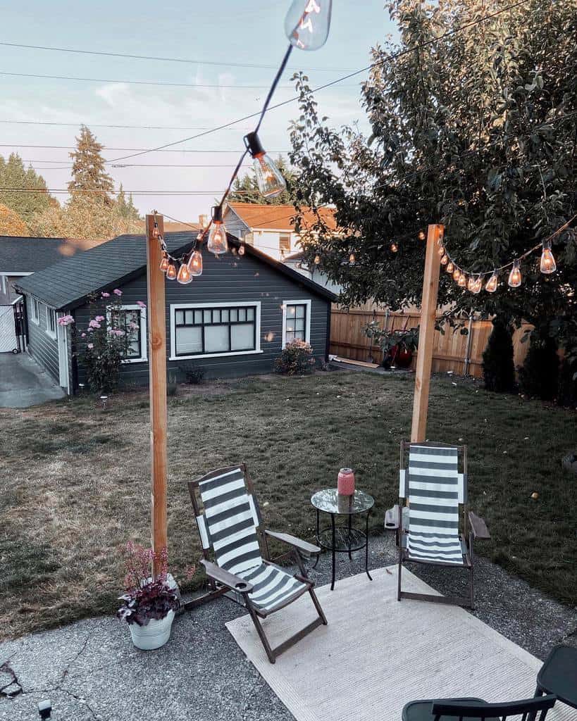 small backyard patio with string lighting
