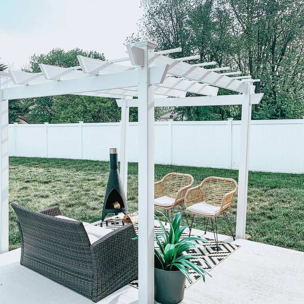 backyard patio white pergola with fire pit 