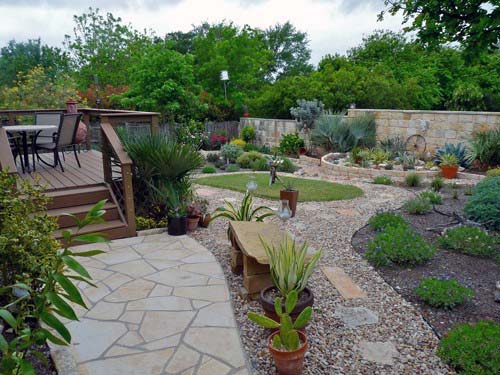 flagstone, gravel, and mulch composite landscape