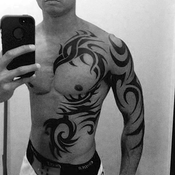 Badass Tribal Phoenix Chest Tattoo Ideas On Guys