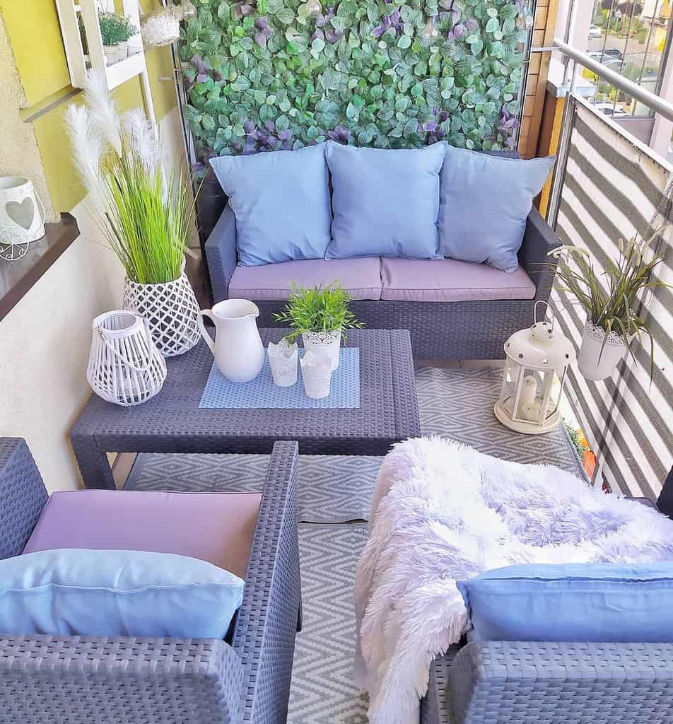 pastel color small balcony patio with floor accent wall 