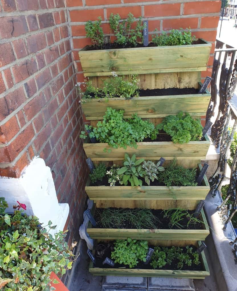stacked wooden planter box herb garden