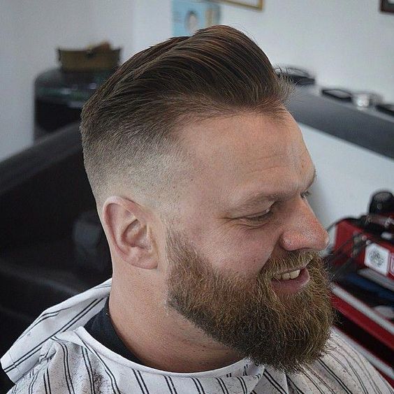 Bald Fade Haircut With Long Beard