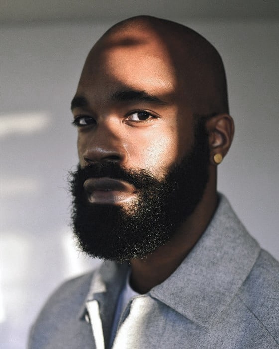 Bald Hairstyle With Medium Beard Style For Black Men
